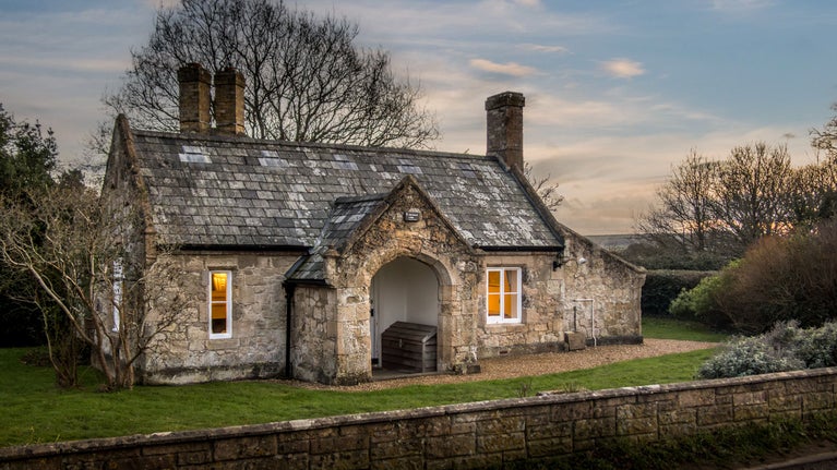 Old Church Lodge, a single-storey stone cottage, Isle Of Wight